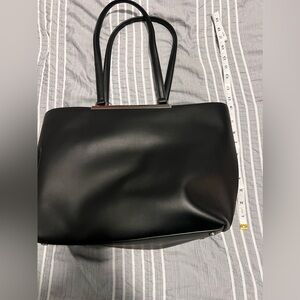 New never used Black and White DKNY purse.